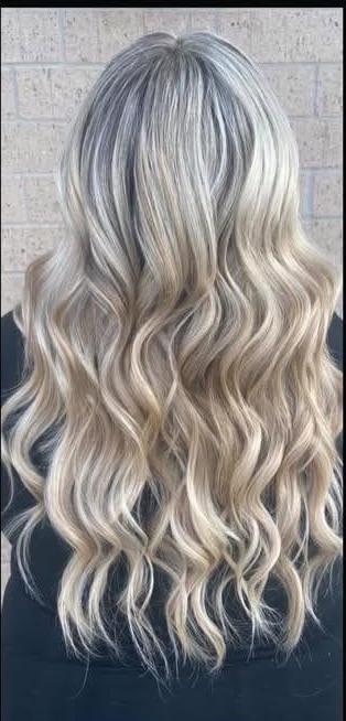 Icy platinum blend over a dark root